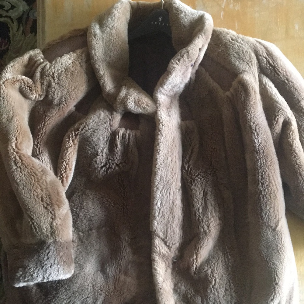 Brown fur with leather panels